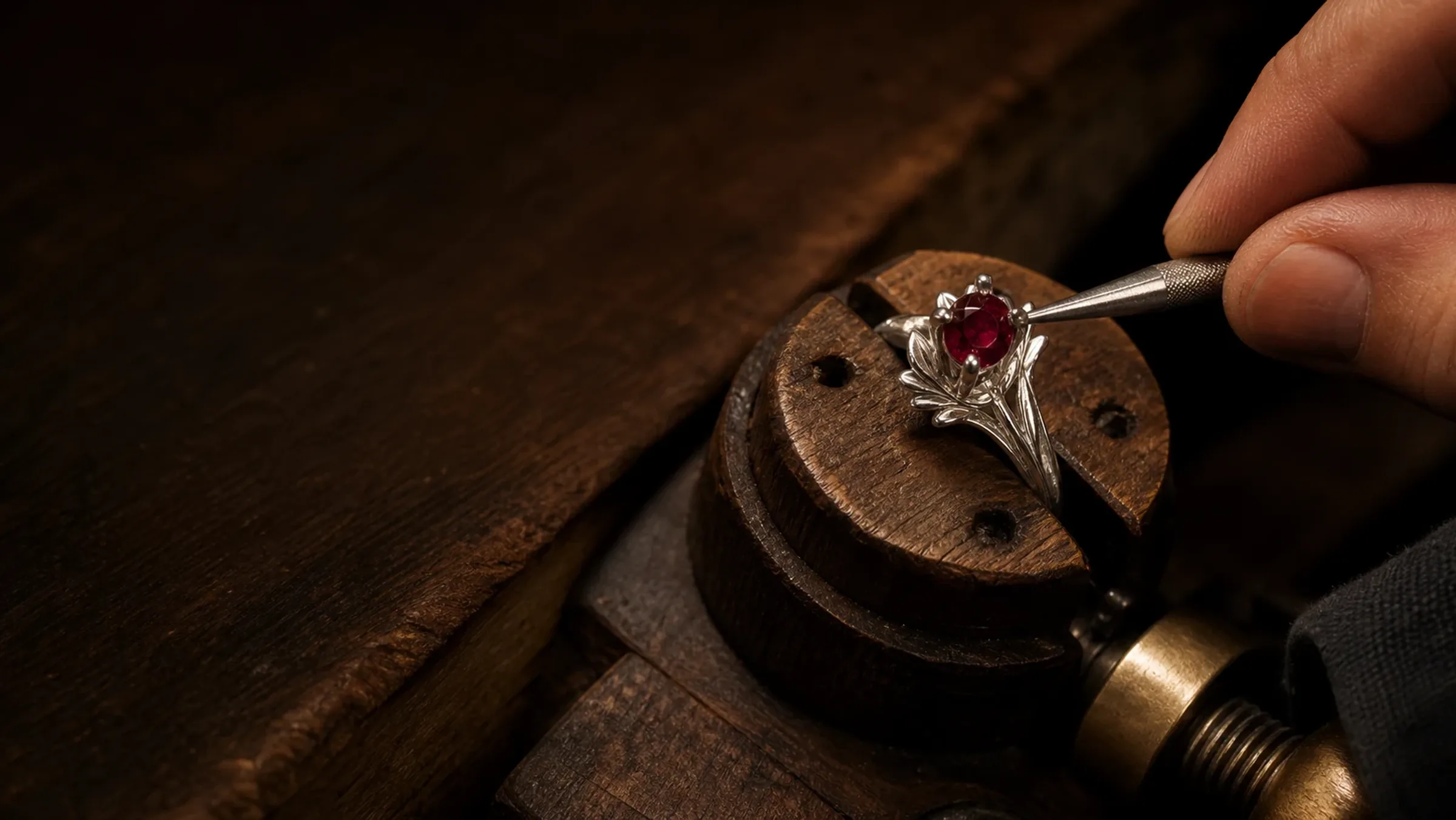 A Ruby jeweller setting a gemstone by hand